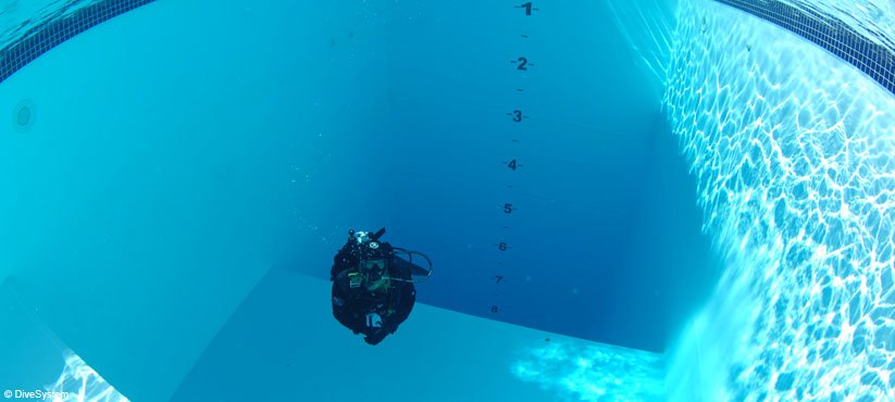 Diver at the bottom of the pool